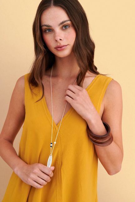 Asymmetric V-neck top with necklace - Yellow